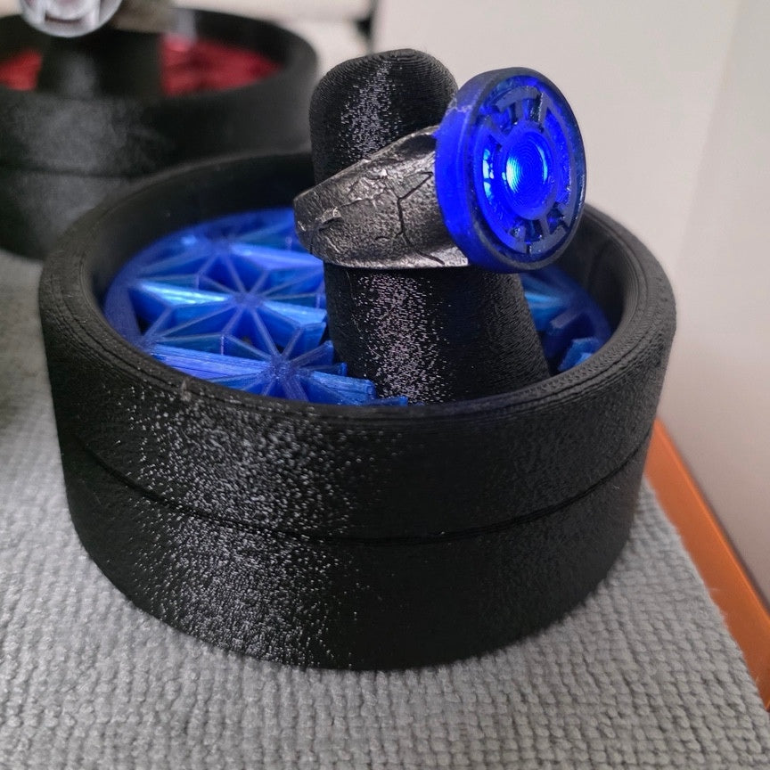 Blue Lantern physical ring and display stand, square side-angle photograph